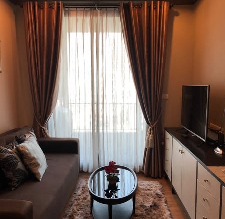 living room and bedroom of The Reserve Kasemsan 3