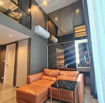 living room and bedroom of The Reserve Phahol-Pradipat