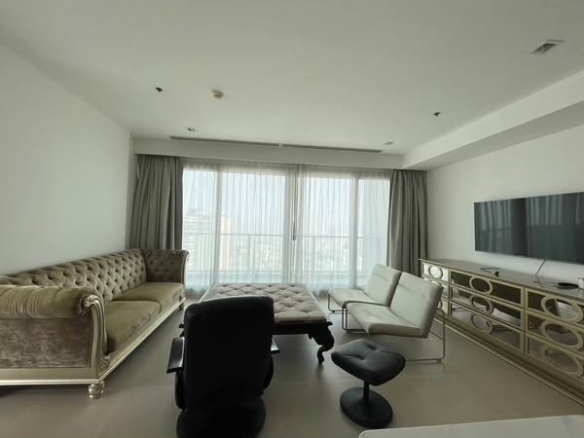 living room and bedroom of The River Condominium