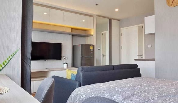 bedroom and living room of The Selected Kaset-Ngamwongwan by LPN