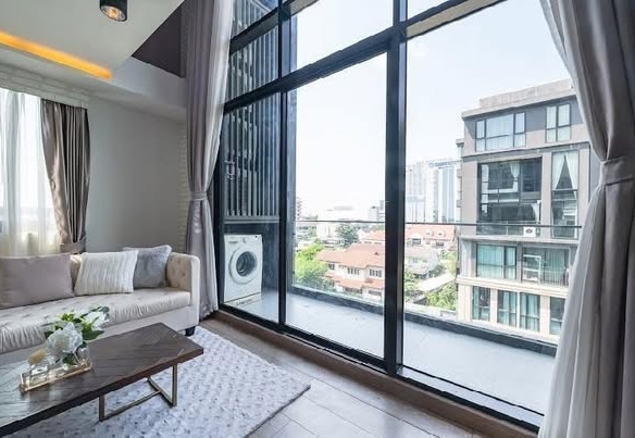 living room and bedroom of The Unique Sukhumvit 62/1