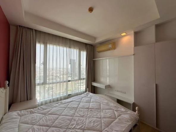 bedroom of Thru Thong Lor